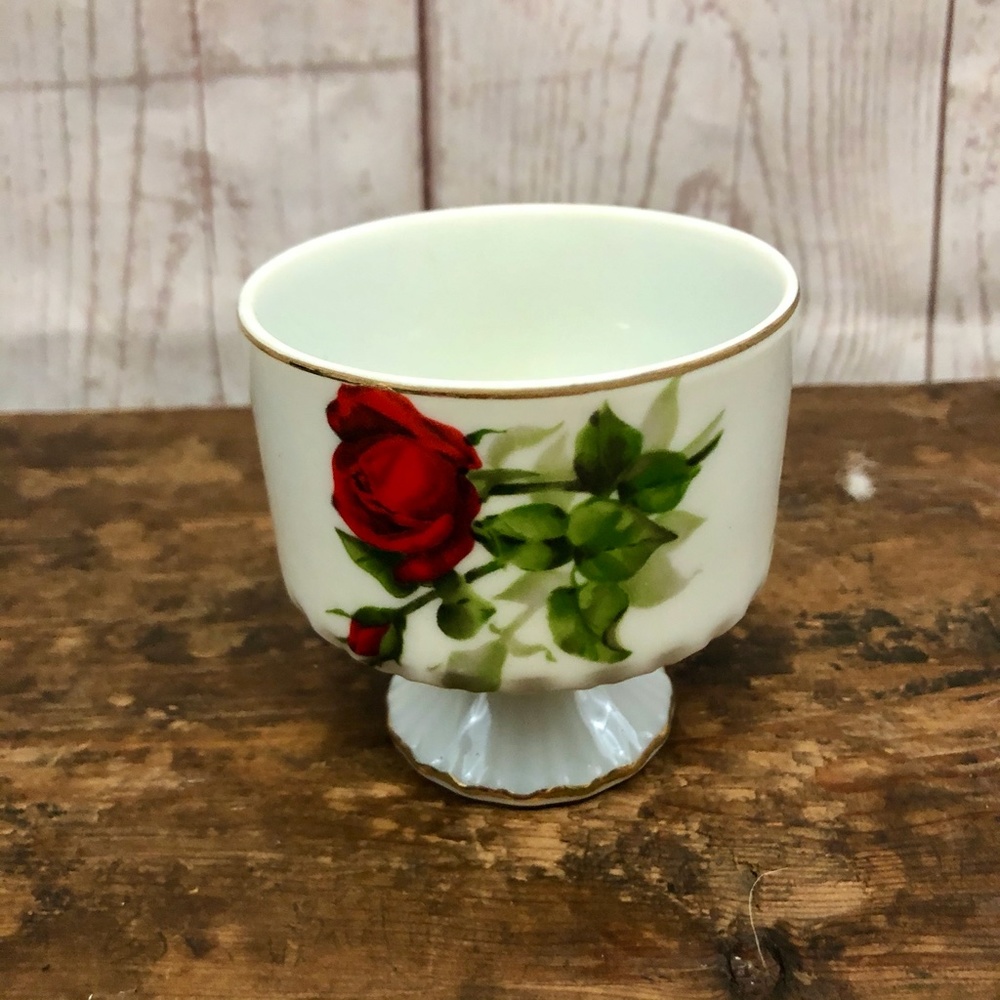 Vintage pedestal base rose pattern cup